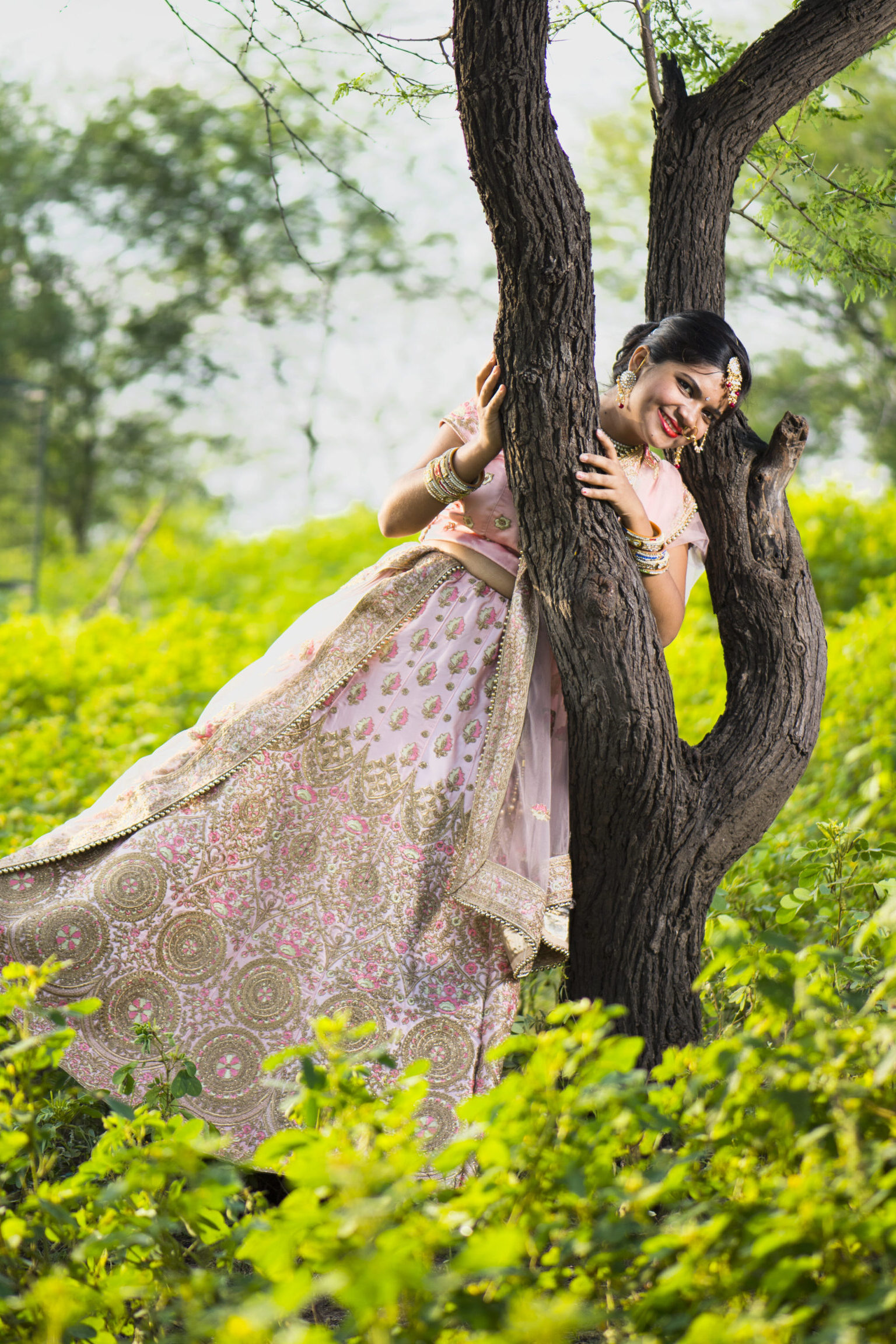 Home beautiful indian bride in traditional wedding dress.